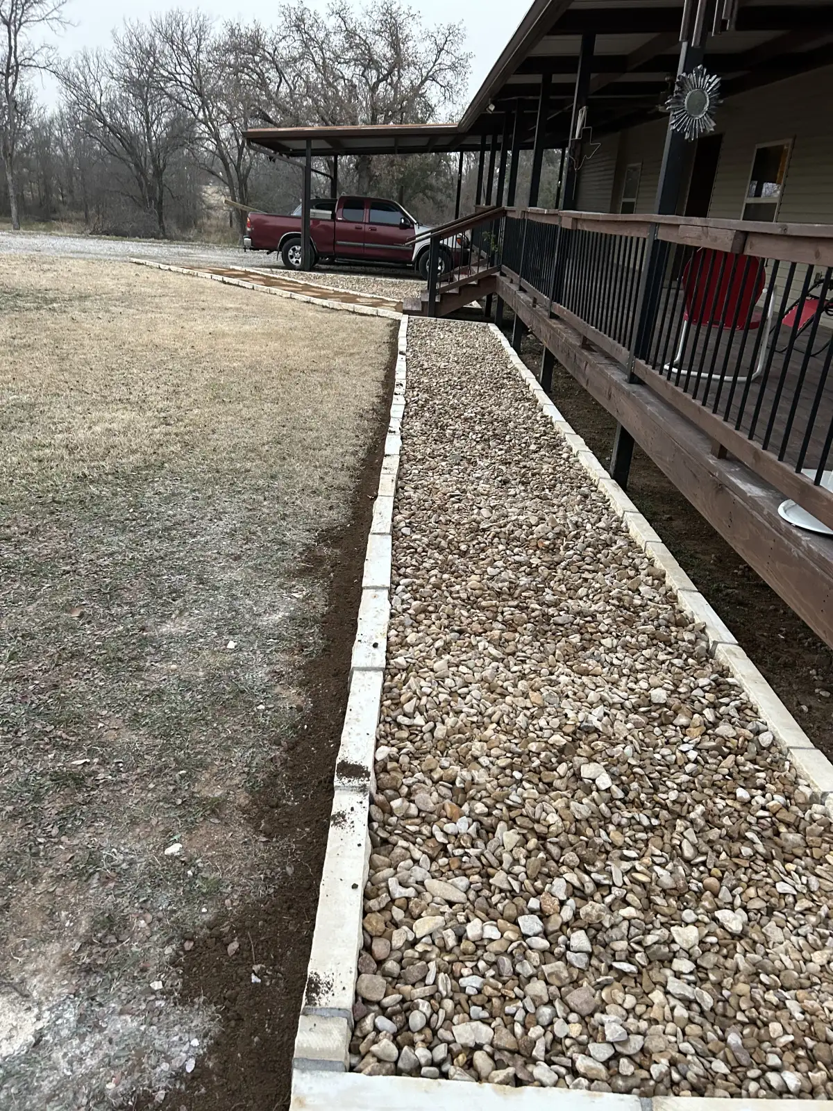 French drain installation with gravel trench in Weatherford TX