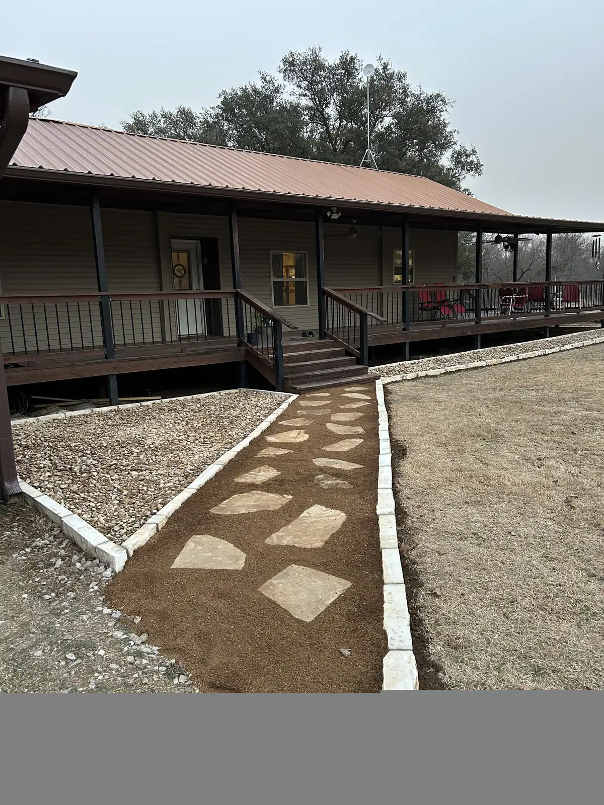Stepping stone pathway through landscaped yard in Weatherford TX