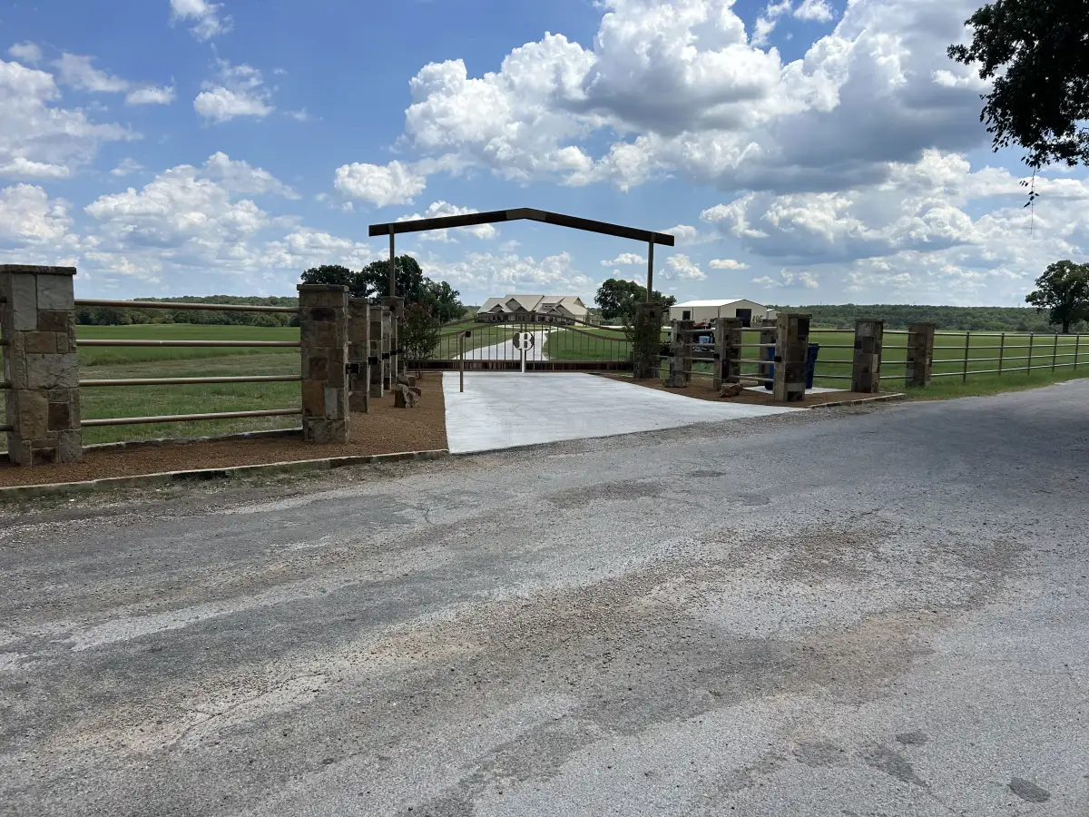 Natural stone entry gate and hardscape installation in Parker County TX