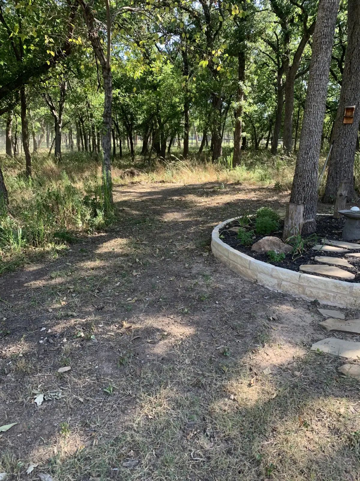 Retaining wall construction with natural stone in Parker County TX